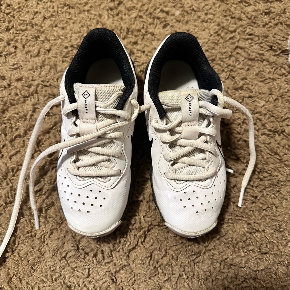 White and Black Nike cleats
